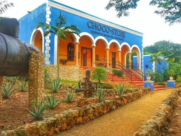 Blue colonial-style entrance to the Choco-Story Uxmal cacao museum in Yucatán